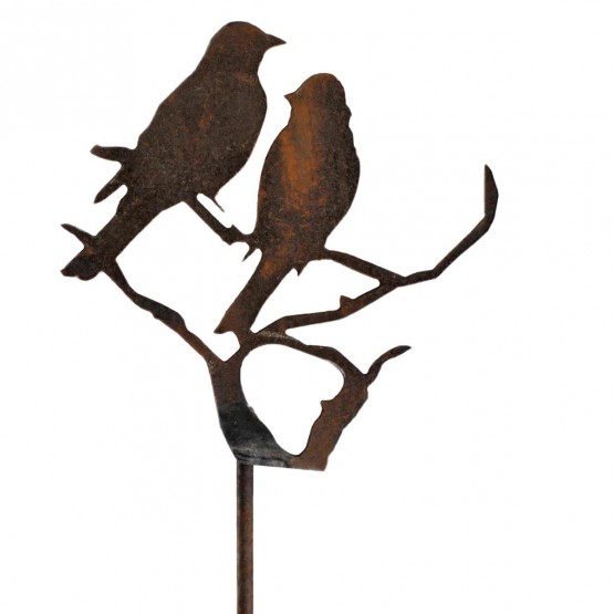 silhouet vogels op een boom in metaal